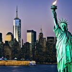 How can I visit the Statue of Liberty in New York Harbor?